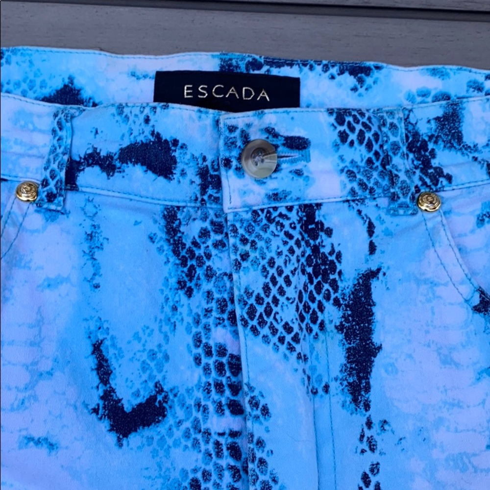 Escada vintage woman’s snake skin pattern.